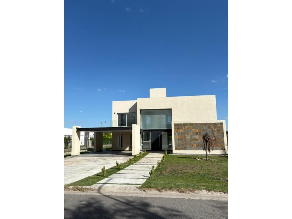 VENTA CASA DE DISEÑO 3 DORMITORIOS EN BARRIO PRIVADO LA ARBOLADA - 1