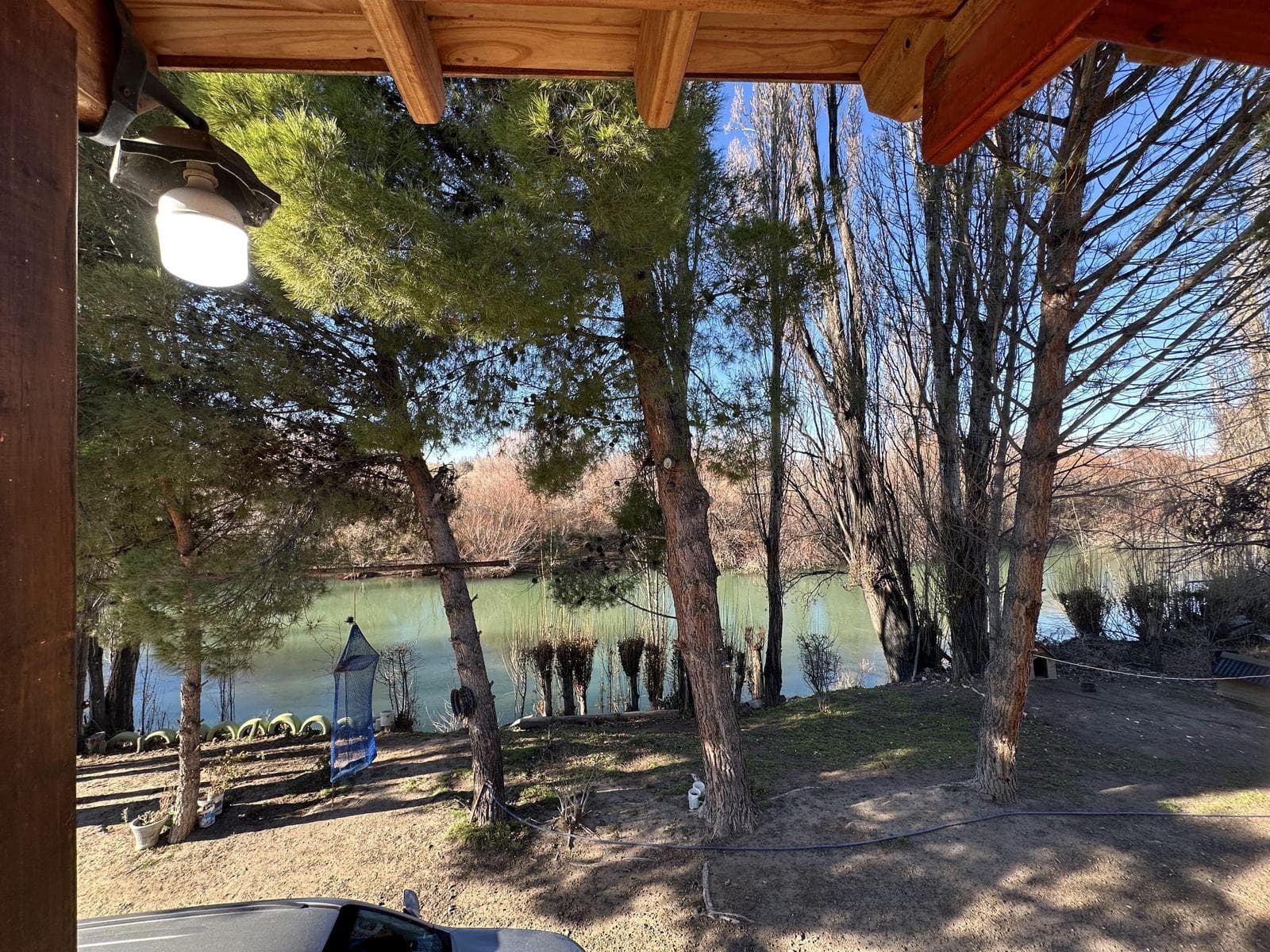 Chacra rodeada por el río chubut con hermosa vivienda - 1