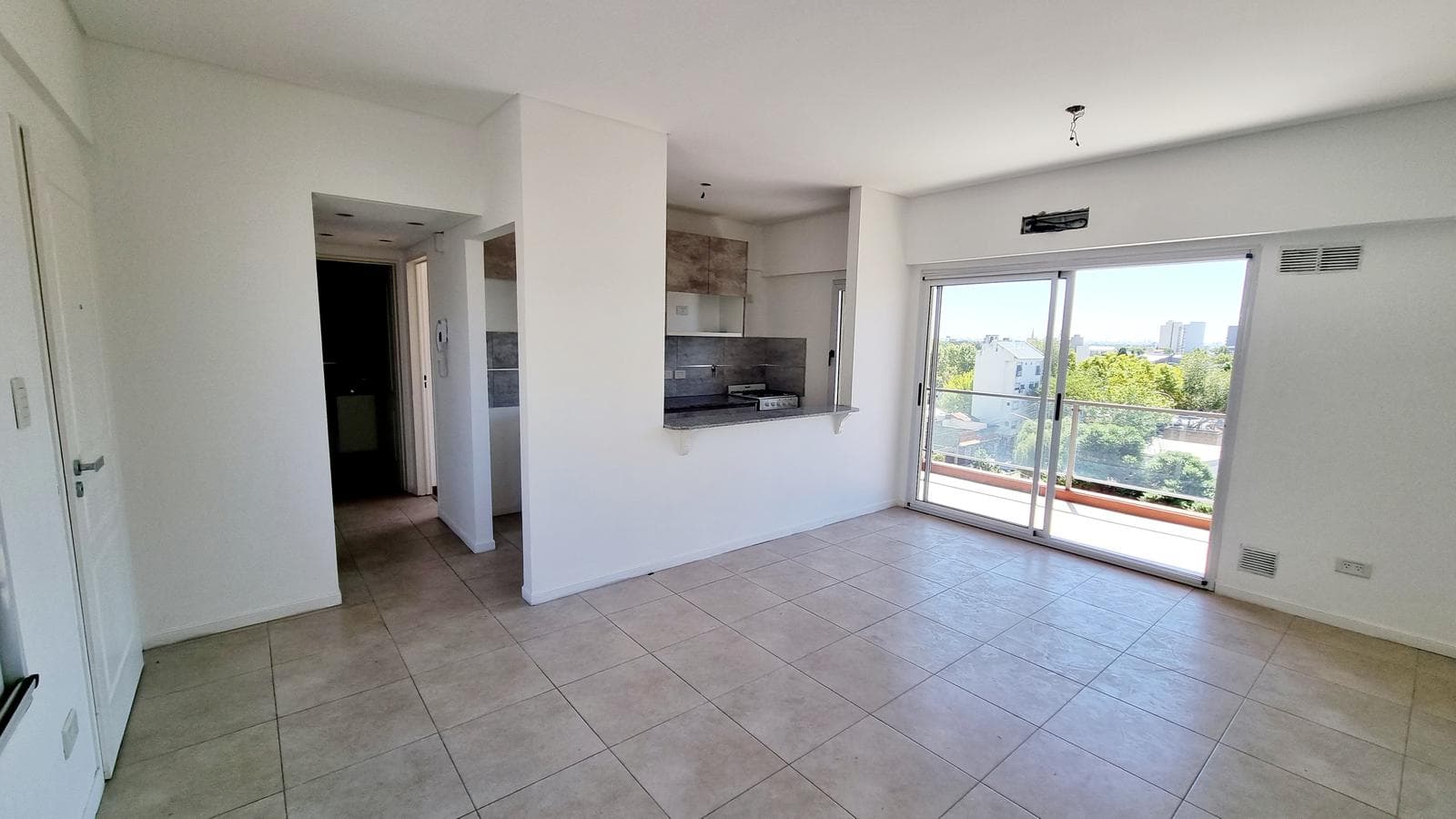 ALQUILER - DEPARTAMENTO 2 AMBIENTES CON COCHERA - 1