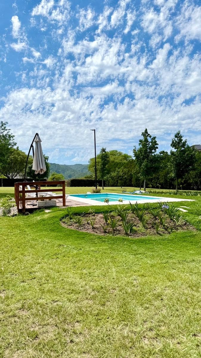 Terreno Villa General Belgrano parquizado 1900 m2 con pileta y casita - 1