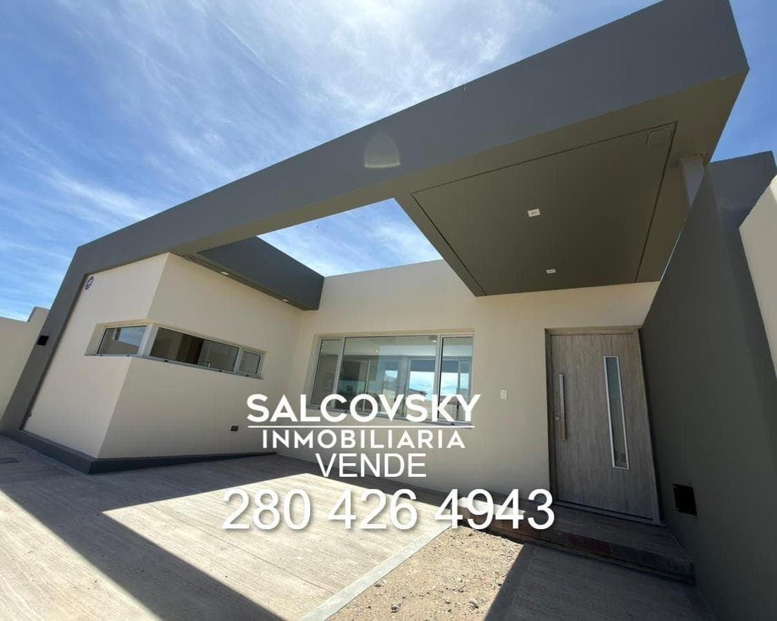 Casa en venta de dos dormitorios a estrenar en Puerto Madryn Dormitorio principal con baño en suite - 1