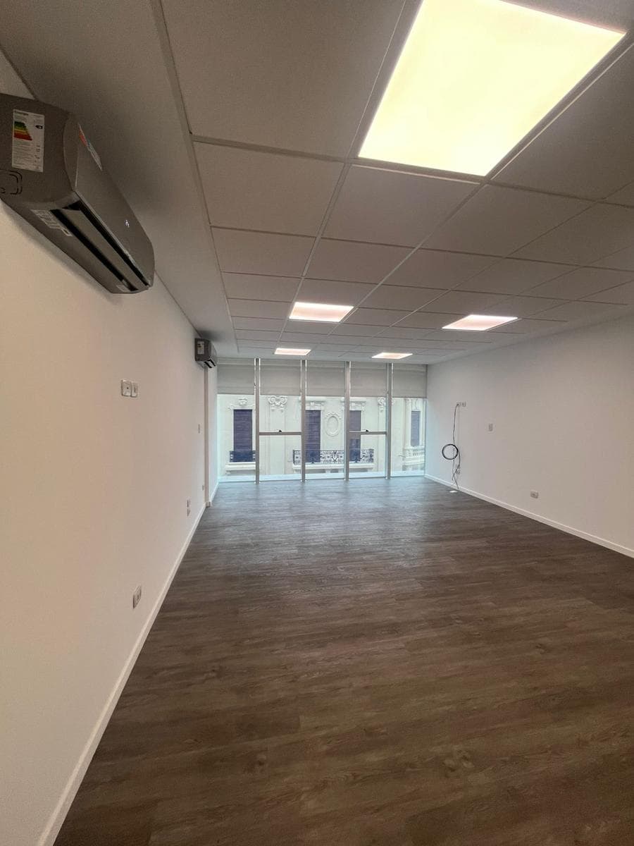 ALQUILER OFICINA PREMIUM CON COCHERA EN EL CENTRO DE ROSARIO - 1